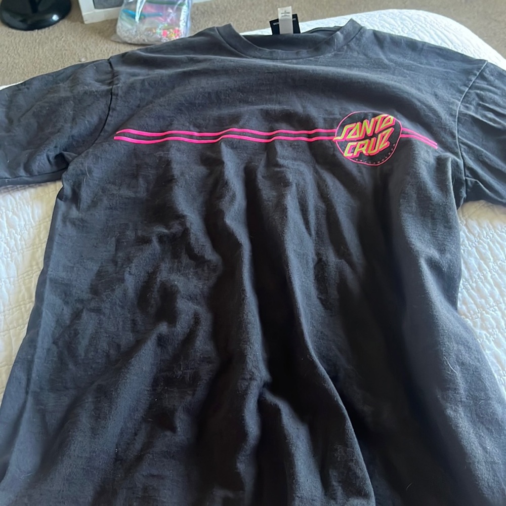 Full length, neon pink and green Santa Cruz shirt